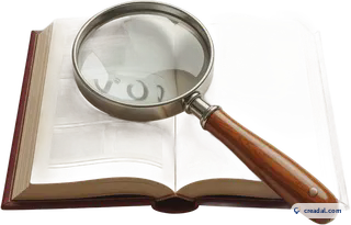 Magnifying glass on book