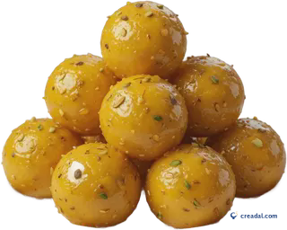 Assiette de laddus dorés