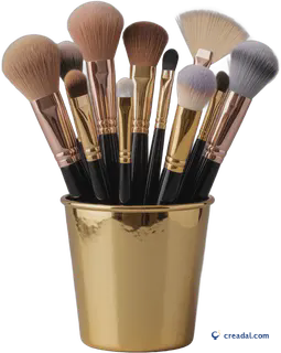 Pinceaux maquillage dorés